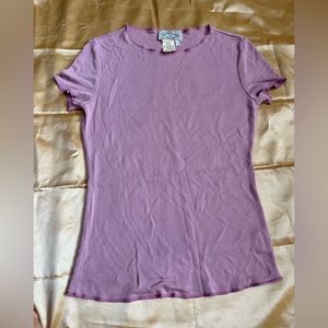 Armani top, stretchy material, size L. I’m size S-M but it fits nicely too.